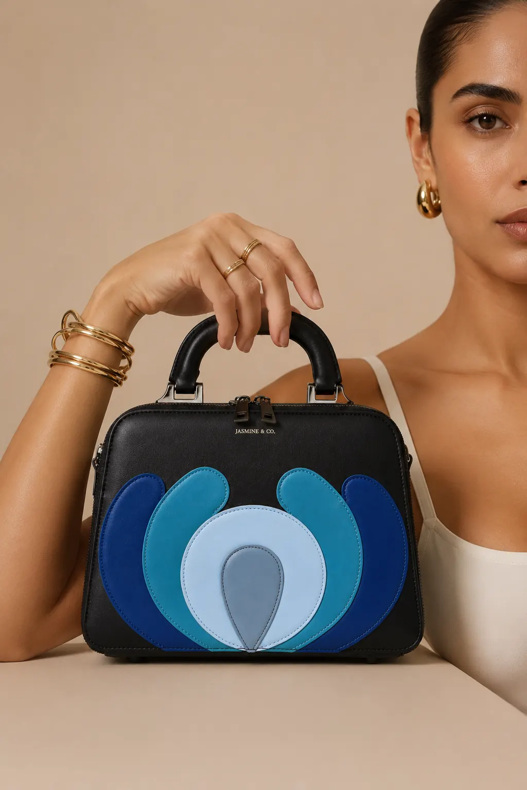 A model holding a leather handbag